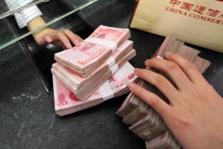 Trung Quốc "bật đèn xanh" cho các ngân hàng xử lý nợ xấu