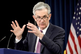 Fed: Covid-19 sẽ tiếp tục kìm hãm tăng trưởng kinh tế Mỹ
