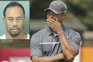 Tay golf Tiger Woods phờ phạc, kêu oan khi bị bắt giam