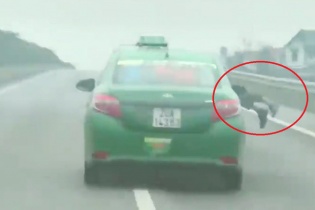 Dư luận phẫn nộ với tài xế taxi hất công an lên nắp capo rồi lao đi vun vút