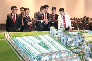 Doanh nghiệp địa ốc rục rịch bung hàng