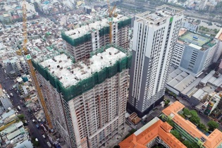 Tiền được bơm, thị trường địa ốc dần lấy lại sinh khí