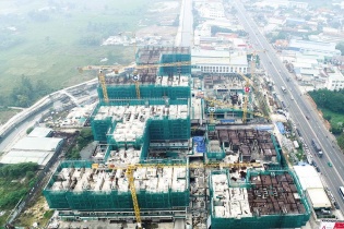 Nhiều doanh nghiệp địa ốc thoát lỗ nhờ “bệ đỡ” tài chính