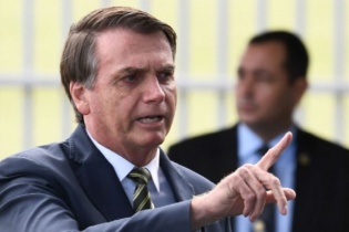 Theo chân Mỹ, Brazil dọa rút khỏi WHO