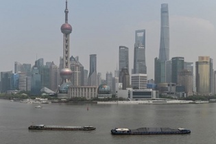 Giới tài chính quốc tế hạ dự báo tăng trưởng kinh tế Trung Quốc