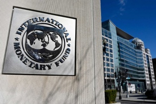 IMF hạ dự báo tăng trưởng toàn cầu