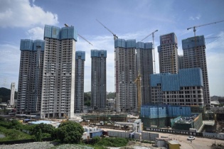 Trung Quốc gỡ vốn cho doanh nghiệp bất động sản gặp khó khăn