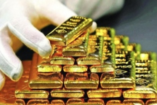 Vàng thế giới tuột mốc 2.800 USD khi đồng đô la Mỹ mạnh lên