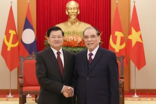 Nguyên Tổng Bí thư Nông Đức Mạnh tiếp Tổng Bí thư, Chủ tịch nước Lào thăm Việt Nam