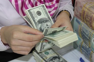 Điều chỉnh tỷ giá tác động tích cực đến cổ phiếu