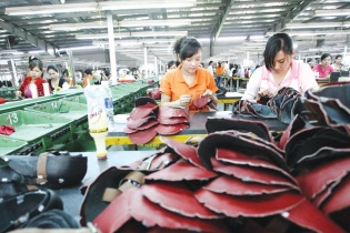 Hai mặt trong xuất khẩu dệt may, da giày sang Mỹ