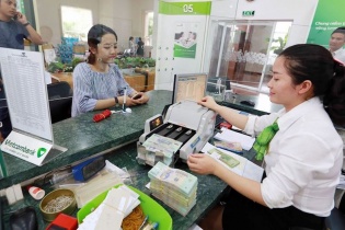 Tín dụng cải thiện tác động lên lợi nhuận ngân hàng