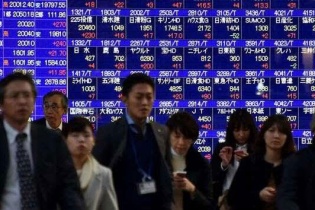 Kỳ vọng lãi suất giúp chứng khoán châu Á giữ sắc xanh