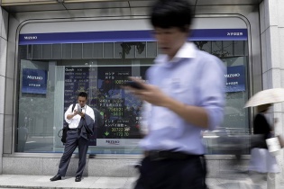 Mỹ-Trung áp thuế mới, chứng khoán châu Á diễn biến trái chiều