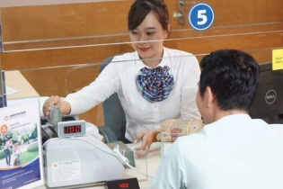 Ngân hàng ứng phó với việc bị siết tăng trưởng tín dụng