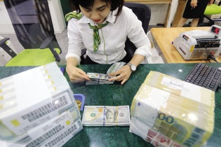 Fed tăng lãi suất, tỷ giá không biến động mạnh