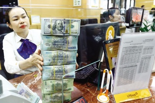 Tỷ giá theo xu hướng giảm dần