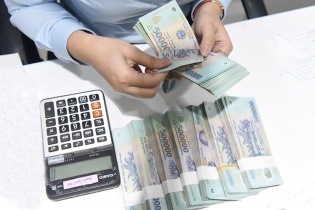 Biên lãi ròng của ngân hàng tiếp tục chịu áp lực giảm