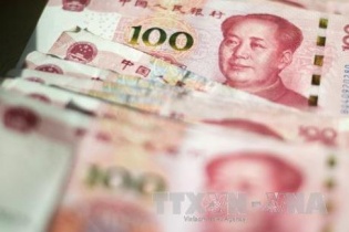 PBoC hạ tỷ giá trung tâm lần đầu sau nửa tháng
