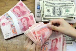 Trước thềm thỏa thuận Mỹ - Trung: Vàng nhích nhẹ, nhân dân tệ giảm giá
