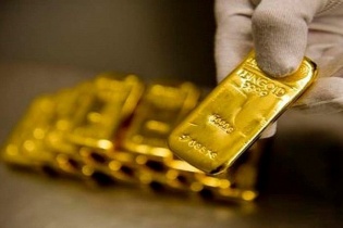 Tuần qua, giá vàng thế giới giảm 1%, USD lại tăng nhiệt