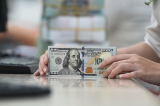 Tỷ giá hạ nhiệt dù USD tăng mạnh sau quyết định giữ nguyên lãi suất của Fed