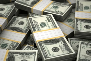 Fed chính thức tăng lãi suất thêm 0,25%, 