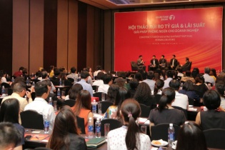 Ngân hàng giúp doanh nghiệp xuất nhập khẩu phòng ngừa rủi ro tỷ giá, lãi suất