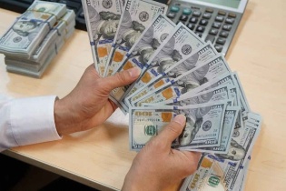 Tỷ giá tăng vừa phải sẽ “kích” xuất khẩu, khó khiến vốn ngoại chảy khỏi Việt Nam