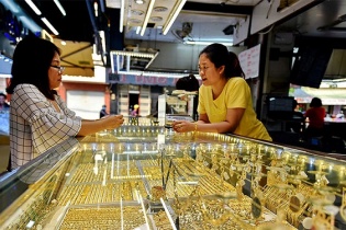 Vàng lấy lại đà tăng hơn 16 USD/ounce