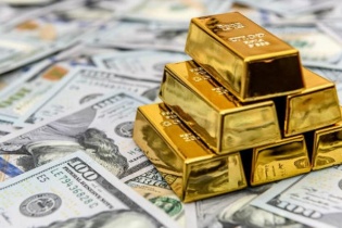 Vàng tăng tiếp phiên cuối tuần, USD quay đầu giảm