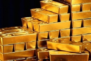Vàng về sát ngưỡng 1.800 USD/ounce dù USD giảm giá