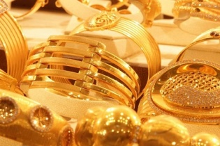 Vàng dự báo tăng đầu tuần này, USD đi xuống