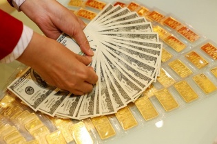 USD tăng trở lại, vàng giảm tiếp phiên đầu tuần