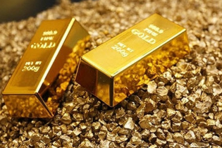 Vàng trên đà đi xuống trong phiên cuối tuần, dù USD giảm