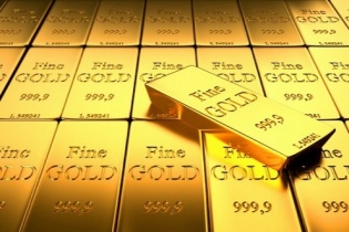 Vàng trên đà đi xuống trước áp lực USD tăng