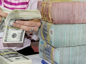 Tín dụng ngoại tệ giảm, VND tăng