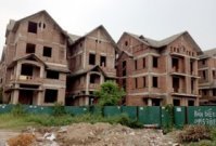 Ôm nợ xấu, gánh tồn kho: Ngân hàng đối đầu BĐS