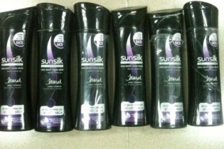 Gửi biếu dầu gội đầu kèm 2 kg tiền chất ma túy đi Úc