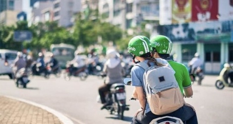 Tăng cước vì tài xế, Grab và Be “bỏ quên” khách hàng